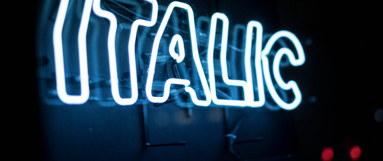 Italic Neon Sign on Adelaide St in Toronto at Spadina